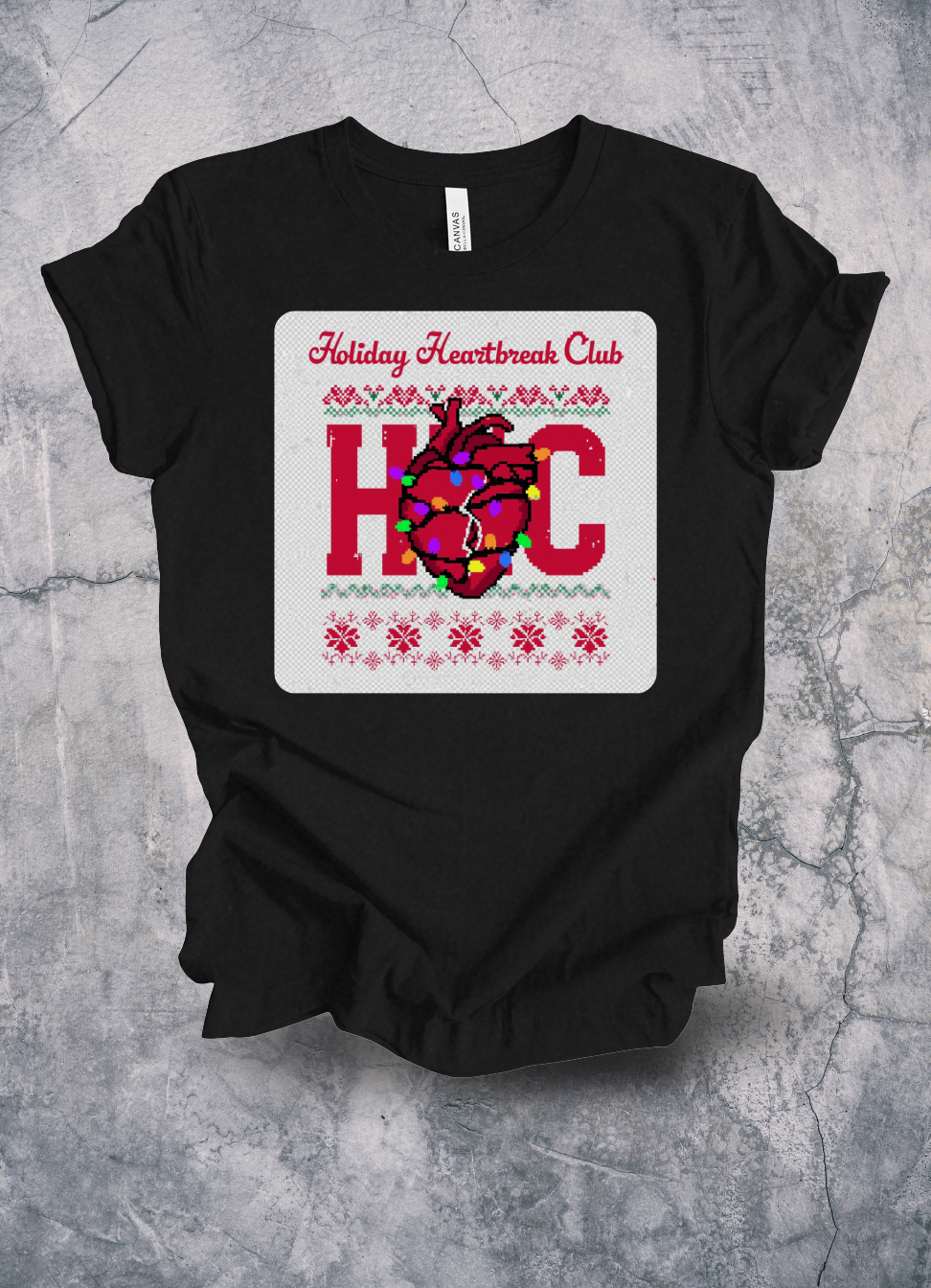 Holiday Heartbreak Club Ugly Christmas Sweater Tee graphic t-shirt by Warped Soul Apparel